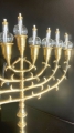 decorative candlestick, 9 arms, 39 cm high, made of brass, polished brass, richly decorated, finished with times, for ampoules, for candles, for the altar, for solemn celebration, mass, eucharist.jpg